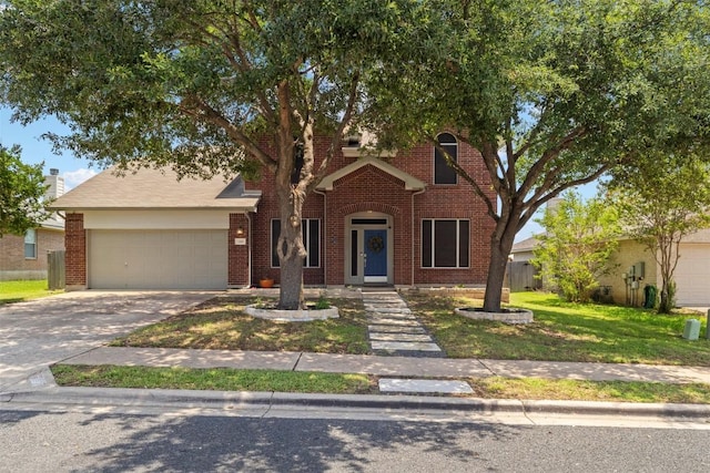 320 Ranier Ln, Round Rock, TX 78665 - view of front of house featuring a garage, concrete driveway, brick siding, and a front lawn