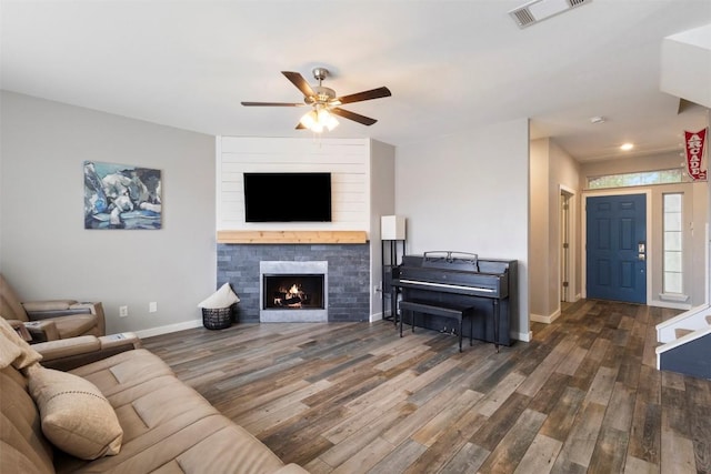 320 Ranier Ln, Round Rock, TX 78665 - living area with ceiling fan, baseboards, wood finished floors, a large fireplace, and recessed lighting
