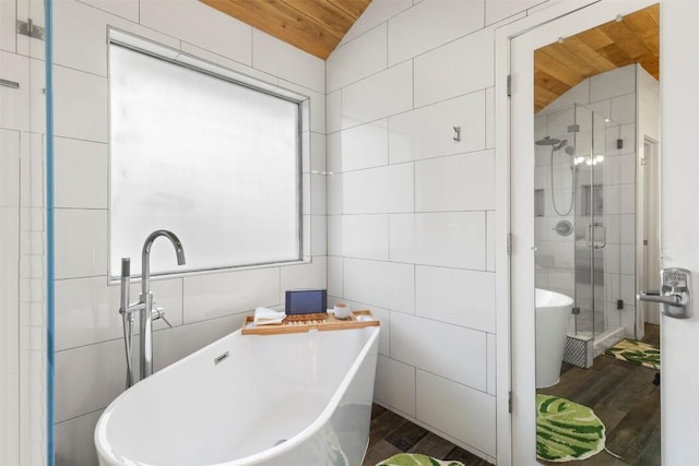320 Ranier Ln, Round Rock, TX 78665 - full bath with a shower stall, a soaking tub, tile walls, vaulted ceiling, and wood ceiling