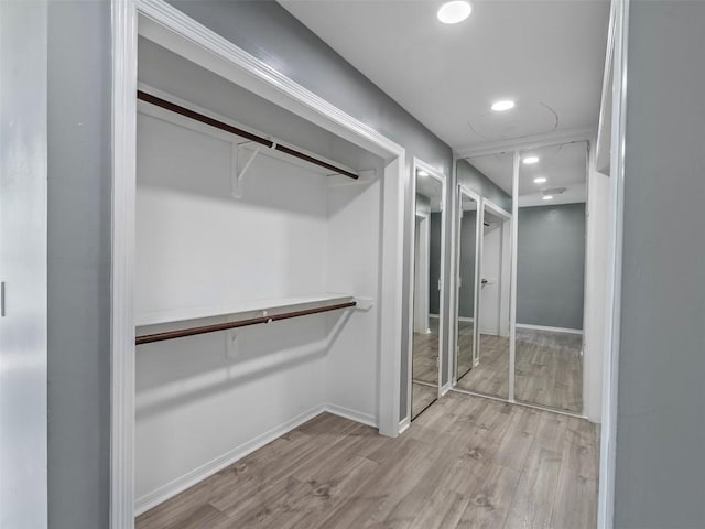 2939 Jeffcote Rd, Conroe, TX 77303 - spacious closet featuring wood finished floors