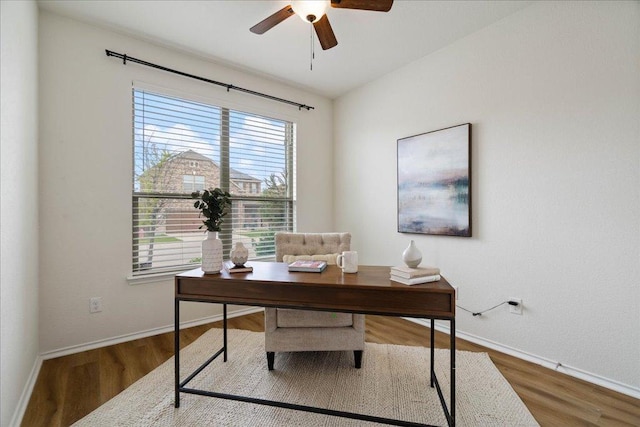 16513 Brogan Ln, Pflugerville, TX 78660 - office area with a ceiling fan, wood finished floors, and baseboards