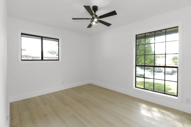 1509 Parkview Ln, San Marcos, TX 78666 - unfurnished room with light wood-style flooring, baseboards, and ceiling fan