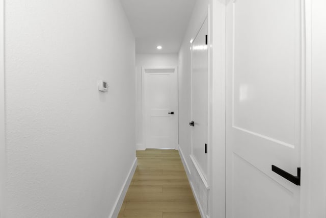 1509 Parkview Ln, San Marcos, TX 78666 - hallway with recessed lighting, baseboards, and light wood-style flooring