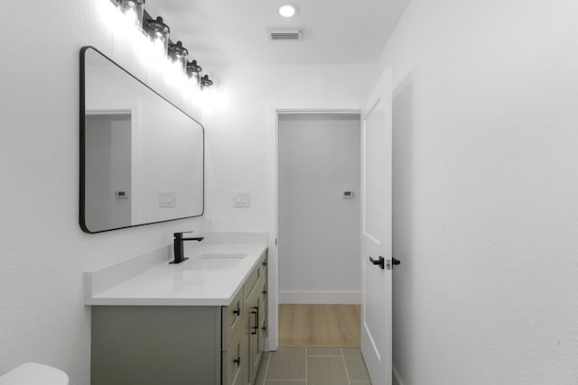 1509 Parkview Ln, San Marcos, TX 78666 - bathroom featuring vanity, tile patterned floors, and toilet