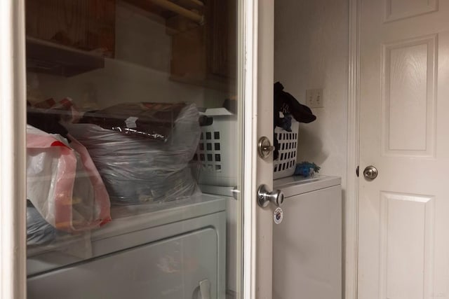 2625 Gwendolyn Ln, Austin, TX 78748 - laundry room featuring cabinet space and washing machine and dryer