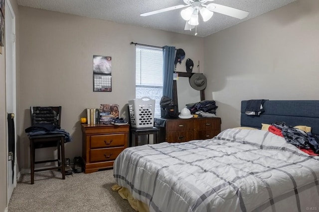 2625 Gwendolyn Ln, Austin, TX 78748 - bedroom with light carpet, a textured ceiling, and a ceiling fan