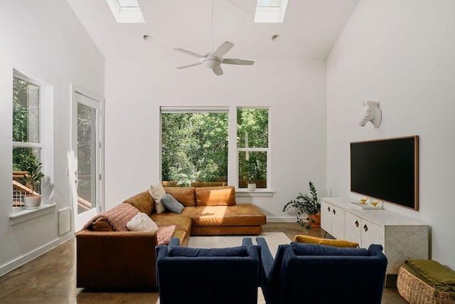 3001 Del Curto Rd Unit 14, Austin, TX 78704 - living area with a skylight, high vaulted ceiling, a ceiling fan, and baseboards