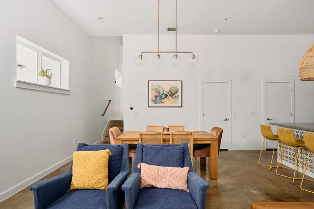 3001 Del Curto Rd Unit 14, Austin, TX 78704 - dining space featuring finished concrete flooring and baseboards