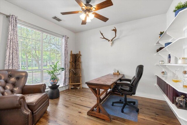 2713 Vaquera Ct, Round Rock, TX 78681 - home office with a ceiling fan and wood finished floors