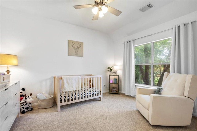 2713 Vaquera Ct, Round Rock, TX 78681 - bedroom with a crib, carpet flooring, lofted ceiling, and ceiling fan