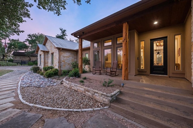 116 Horseshoe Dr, Dripping Springs, TX 78620 - entrance to property featuring covered porch and metal roof