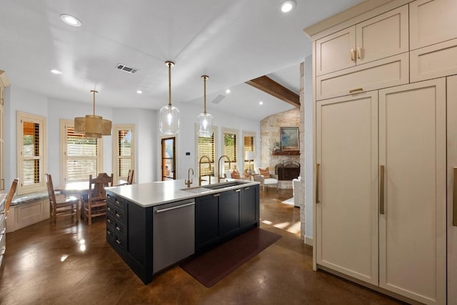 116 Horseshoe Dr, Dripping Springs, TX 78620 - kitchen featuring dishwasher, recessed lighting, an island with sink, decorative light fixtures, and light countertops