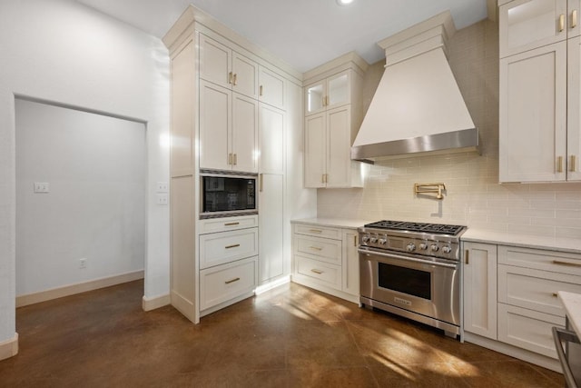 116 Horseshoe Dr, Dripping Springs, TX 78620 - kitchen with luxury stove, black microwave, premium range hood, tasteful backsplash, and glass insert cabinets