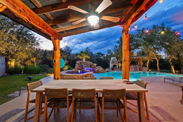116 Horseshoe Dr, Dripping Springs, TX 78620 - view of patio with a ceiling fan, outdoor dining space, and a pool with connected hot tub