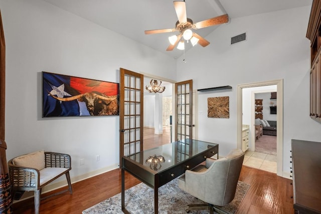 116 Horseshoe Dr, Dripping Springs, TX 78620 - office area with wood finished floors, a ceiling fan, french doors, and high vaulted ceiling