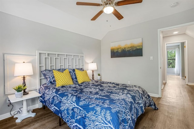 125 San Jacinto St, Bastrop, TX 78602 - bedroom featuring lofted ceiling, wood finished floors, baseboards, and ceiling fan