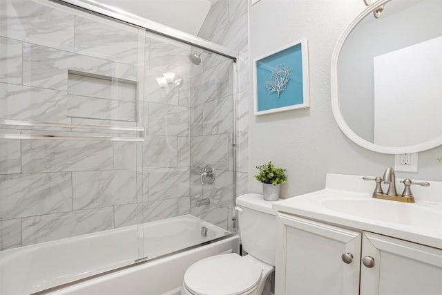 125 San Jacinto St, Bastrop, TX 78602 - full bath featuring toilet, shower / bath combination with glass door, and vanity