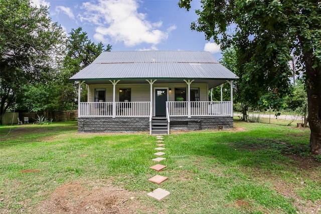 125 San Jacinto St, Bastrop, TX 78602 - view of front of property featuring a porch and metal roof