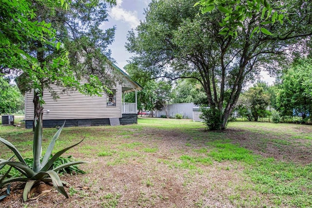 125 San Jacinto St, Bastrop, TX 78602 - view of yard featuring central AC