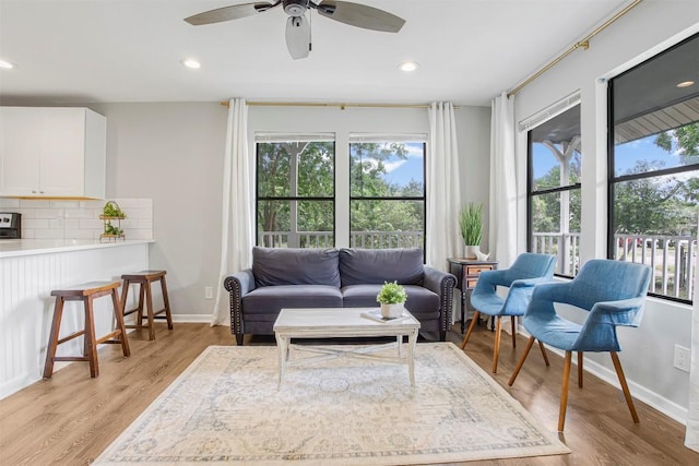 125 San Jacinto St, Bastrop, TX 78602 - living area with a ceiling fan, baseboards, recessed lighting, and light wood-style floors