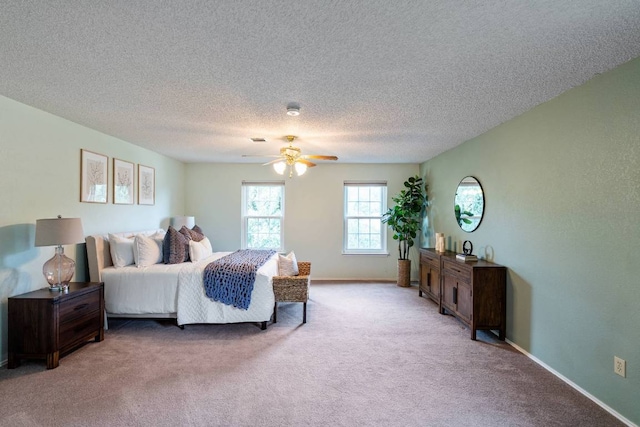 1202 Tremont Dr, Cedar Park, TX 78613 - bedroom featuring light colored carpet, a textured ceiling, baseboards, and a ceiling fan