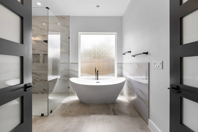 14804 Arrowhead Dr, Leander, TX 78641 - full bathroom featuring a freestanding tub and a marble finish shower