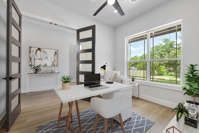 14804 Arrowhead Dr, Leander, TX 78641 - office featuring wood finished floors, ceiling fan, and recessed lighting