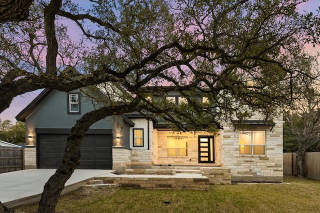 14804 Arrowhead Dr, Leander, TX 78641 - view of front of house with stone siding and concrete driveway