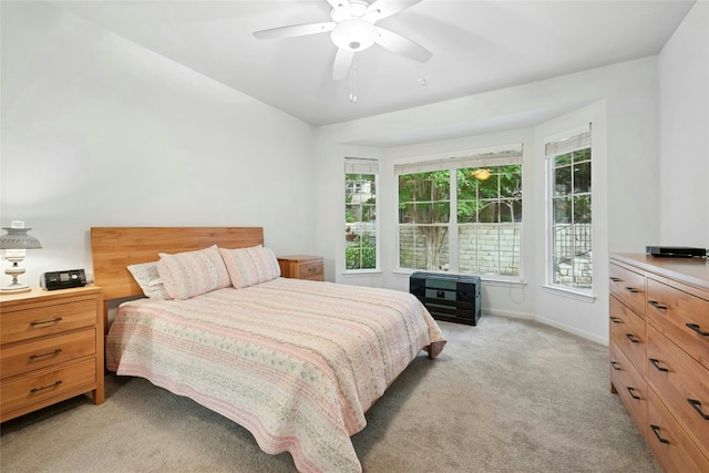 308 Hills Of Texas Trl, Georgetown, TX 78633 - bedroom featuring light colored carpet, ceiling fan, and baseboards