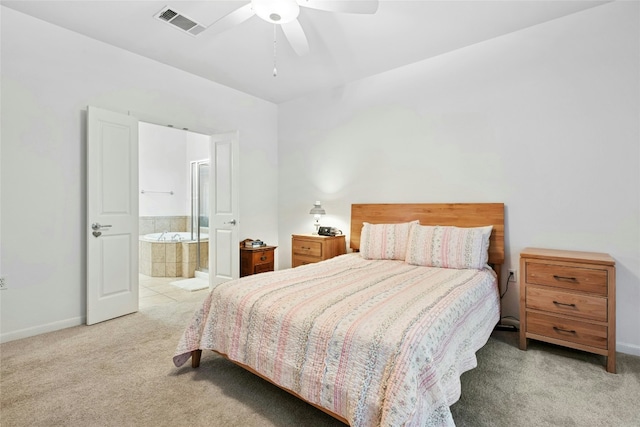 308 Hills Of Texas Trl, Georgetown, TX 78633 - carpeted bedroom with baseboards, ceiling fan, and connected bathroom