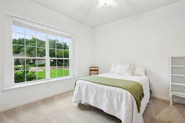 308 Hills Of Texas Trl, Georgetown, TX 78633 - carpeted bedroom featuring baseboards and ceiling fan