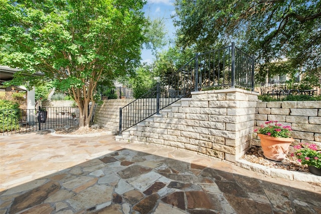 308 Hills Of Texas Trl, Georgetown, TX 78633 - gate featuring stairway and a patio area