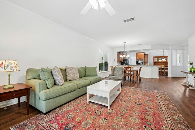 308 Hills Of Texas Trl, Georgetown, TX 78633 - living area with dark wood-style floors, healthy amount of natural light, and ornamental molding