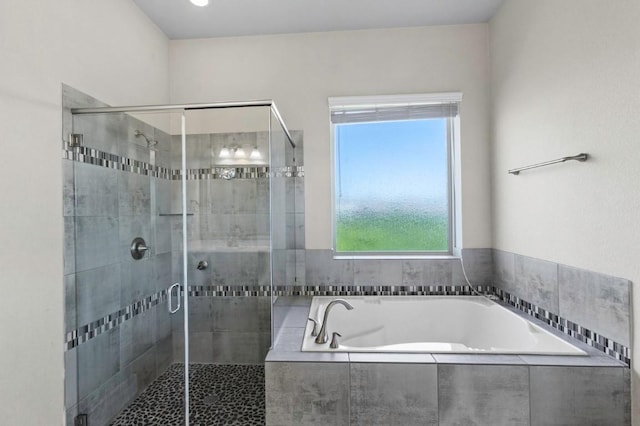 18716 Waltz Ct, Austin, TX 78738 - bathroom with a garden tub and a shower stall