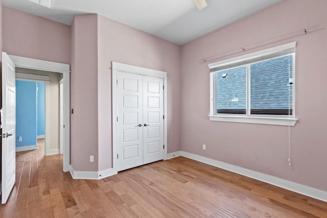 18716 Waltz Ct, Austin, TX 78738 - unfurnished bedroom with light wood-type flooring, baseboards, and a closet
