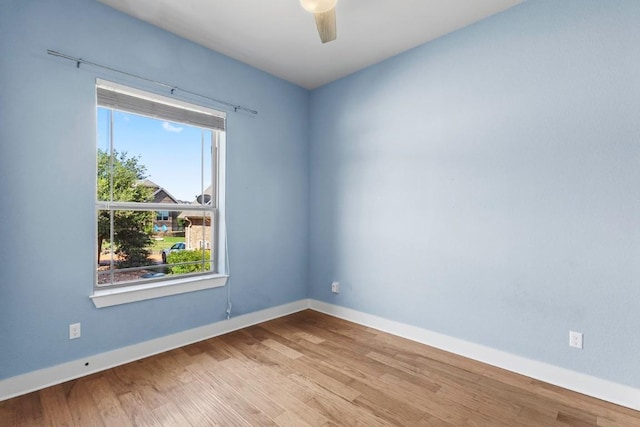 18716 Waltz Ct, Austin, TX 78738 - spare room featuring baseboards, wood finished floors, and ceiling fan
