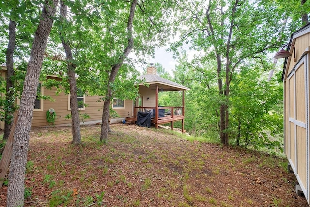 108 Kaliu Ct, Bastrop, TX 78602 - view of yard with a deck