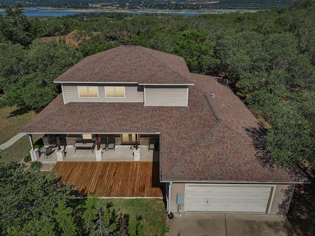 600 Augusta Cir N, Point Venture, TX 78645 - view from above of property featuring a heavily wooded area