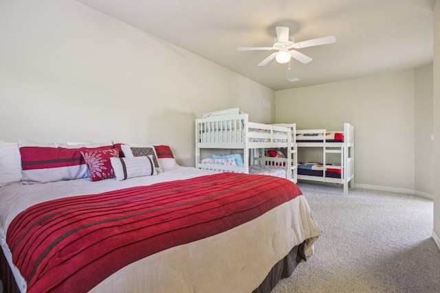 600 Augusta Cir N, Point Venture, TX 78645 - bedroom featuring carpet flooring, baseboards, and ceiling fan