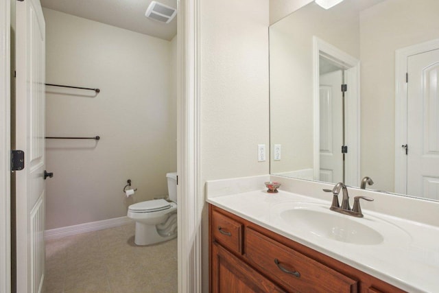 600 Augusta Cir N, Point Venture, TX 78645 - bathroom with vanity, toilet, tile patterned floors, and baseboards