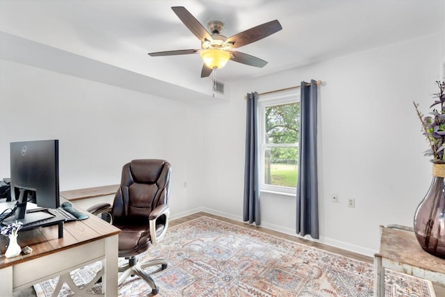 283 Rockdale W Rd, Rockdale, TX 76567 - office with a ceiling fan and baseboards