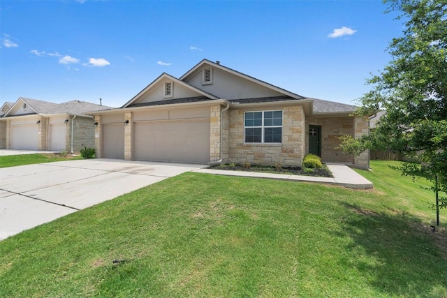 632 Otto Ave, Georgetown, TX 78626 - ranch-style home featuring driveway, a garage, stone siding, and a front lawn
