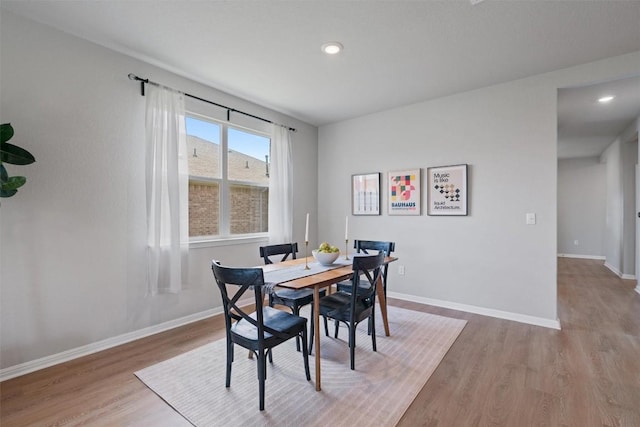 632 Otto Ave, Georgetown, TX 78626 - dining space featuring wood finished floors and recessed lighting
