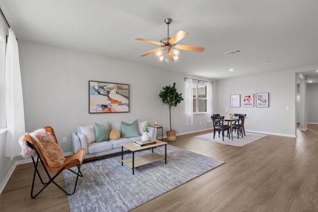 632 Otto Ave, Georgetown, TX 78626 - living room featuring wood finished floors, a ceiling fan, and recessed lighting