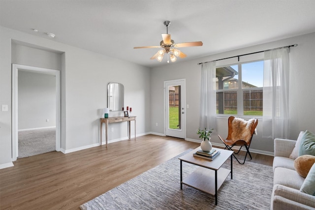 632 Otto Ave, Georgetown, TX 78626 - living area featuring wood finished floors and a ceiling fan