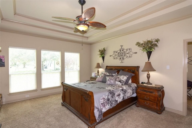 1265 Mourning Dove Ct, Salado, TX 76571 - bedroom featuring a raised ceiling, ornamental molding, light carpet, baseboards, and ceiling fan