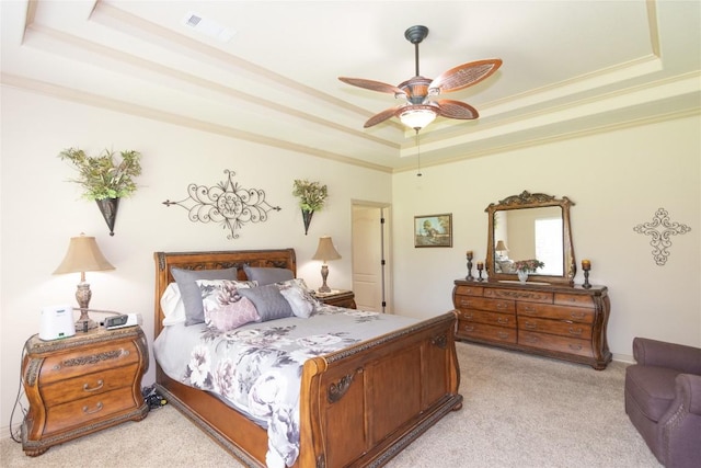 1265 Mourning Dove Ct, Salado, TX 76571 - bedroom featuring a tray ceiling, light colored carpet, a ceiling fan, and ornamental molding