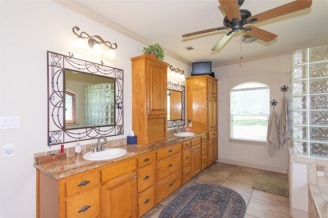 1265 Mourning Dove Ct, Salado, TX 76571 - full bath featuring a ceiling fan, double vanity, ornamental molding, a shower, and tile patterned flooring