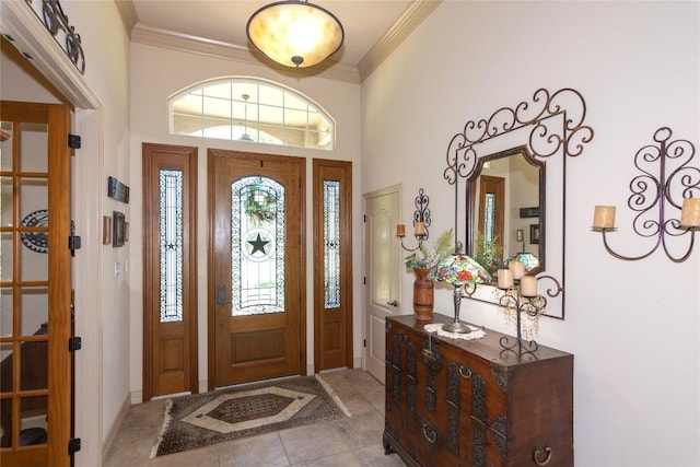 1265 Mourning Dove Ct, Salado, TX 76571 - entrance foyer featuring ornamental molding, light tile patterned flooring, and baseboards