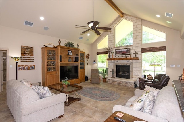 1265 Mourning Dove Ct, Salado, TX 76571 - living area featuring a ceiling fan, a fireplace, beamed ceiling, high vaulted ceiling, and light tile patterned floors